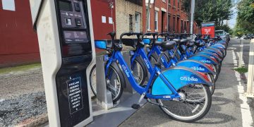 bikes for rent in a parking lot