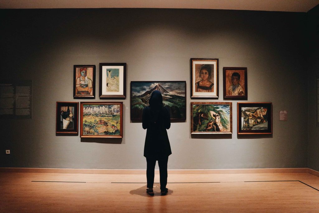 person looking at art