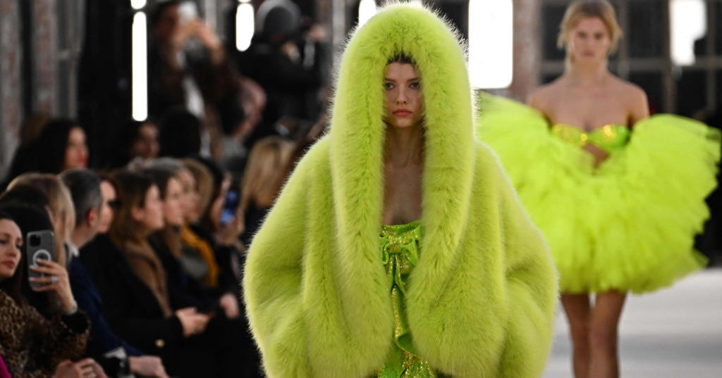 model wearing neon green clothes at nyfw 2023
